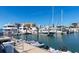 A marina full of boats on the water under a bright blue sky at 4063 Westbourne Cir, Sarasota, FL 34238