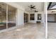 The spacious patio features stone pavers, ceiling fans, and seamless access to indoor and outdoor living at 4063 Westbourne Cir, Sarasota, FL 34238