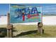 Sign indicating Siesta Key Beach in Sarasota, Florida, as the #1 beach in the USA at 4063 Westbourne Cir, Sarasota, FL 34238