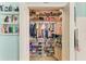 Walk-in closet with shelving and clothing rods for ample storage and organization at 4211 30Th E Ln, Bradenton, FL 34208