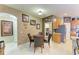 Dining room with round table, seating for four, and wall decor at 4211 30Th E Ln, Bradenton, FL 34208
