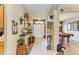 The tiled foyer showcases tasteful decorations and archways leading to the billiards and dining room at 4211 30Th E Ln, Bradenton, FL 34208