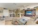 Spacious living area showcases Dallas Cowboys memorabilia and a comfortable, open layout at 4211 30Th E Ln, Bradenton, FL 34208