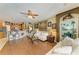 Inviting living room showcasing an open floor plan to the kitchen and a comfortable seating arrangement at 4211 30Th E Ln, Bradenton, FL 34208