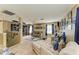 Spacious living room is decorated with Dallas Cowboys memorabilia and neutral furniture at 4211 30Th E Ln, Bradenton, FL 34208
