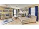 The spacious living room features Dallas Cowboys themed decorations and comfortable seating at 4211 30Th E Ln, Bradenton, FL 34208