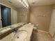 Bathroom with granite countertops and updated fixtures at 5330 Hyland Hills Ave # 2314, Sarasota, FL 34241