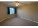 Bright bedroom with carpet and natural light at 5330 Hyland Hills Ave # 2314, Sarasota, FL 34241