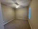 Spacious bedroom with carpet, ceiling fan, and natural light at 5330 Hyland Hills Ave # 2314, Sarasota, FL 34241