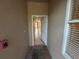 Inviting entryway features tile flooring, neutral paint, and an open doorway leading into the home at 5330 Hyland Hills Ave # 2314, Sarasota, FL 34241