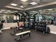 Fully-equipped fitness center with modern machines, free weights, and mirrored walls for effective workouts at 5330 Hyland Hills Ave # 2314, Sarasota, FL 34241