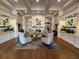Elegant lobby featuring stylish seating, coffered ceilings, a fireplace, and decorative wall accents at 5330 Hyland Hills Ave # 2314, Sarasota, FL 34241