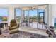 Bright and airy living room with patio access, boasting stunning views at 5430 Eagles Point Cir # 101, Sarasota, FL 34231