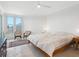 Bright main bedroom with tile flooring, ceiling fan, and lots of natural light at 5430 Eagles Point Cir # 101, Sarasota, FL 34231
