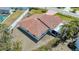 Aerial view of a home's new tile roof and spacious backyard, with a glimpse of the pool area at 5522 Calle Del Verano, Sarasota, FL 34242