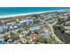 Aerial view of Siesta Key neighborhood, showcasing a house with a pool near the beach at 5522 Calle Del Verano, Sarasota, FL 34242