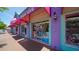 Colorful storefront of Beach Toys, with pink and turquoise accents and a variety of beach-themed items at 5522 Calle Del Verano, Sarasota, FL 34242
