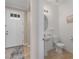 Convenient half-bathroom located off the entry way at 6017 Maidenstone Way, Palmetto, FL 34221
