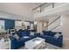 Spacious living area with view to kitchen, lots of seating and bright lighting at 6017 Maidenstone Way, Palmetto, FL 34221