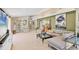 Inviting living room with tile floors, neutral paint, and comfortable seating at 6412 Sun Eagle Ln, Bradenton, FL 34210