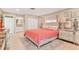 Spacious main bedroom with ensuite bathroom featuring tile floors, closet and neutral tones at 6412 Sun Eagle Ln, Bradenton, FL 34210