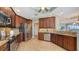 Modern kitchen featuring stainless steel appliances and granite countertops at 6465 Watercrest Way # 404, Lakewood Ranch, FL 34202