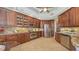 Gourmet kitchen featuring stainless steel appliances, granite countertops, and ample cabinetry at 6465 Watercrest Way # 404, Lakewood Ranch, FL 34202