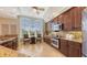A spacious kitchen with lots of cabinets, countertops and a breakfast nook at 6465 Watercrest Way # 404, Lakewood Ranch, FL 34202