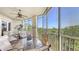 Relaxing screened lanai with comfortable seating and a scenic view at 6465 Watercrest Way # 404, Lakewood Ranch, FL 34202