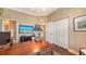 Comfortable office with hardwood floors and a view into a bathroom at 6465 Watercrest Way # 404, Lakewood Ranch, FL 34202