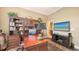 Well-appointed office includes custom built-ins and a view into the bathroom at 6465 Watercrest Way # 404, Lakewood Ranch, FL 34202