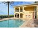 Outdoor pool and building, showcasing an inviting recreational space with convenient amenities at 6465 Watercrest Way # 404, Lakewood Ranch, FL 34202