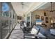 Balcony featuring an outdoor seating area and a view into the living room at 6748 Fairview Ter # 4-202, Bradenton, FL 34203