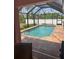 Screened in pool with brick paver surround at 7286 Mineola Rd, Englewood, FL 34224