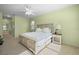Bright bedroom with ample sunlight, soft colors, and a view of the outdoors at 7424 Arrowhead Run, Lakewood Ranch, FL 34202