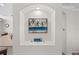 Cozy display niche in living area with beach-themed decor, enhancing the home's aesthetic at 7424 Arrowhead Run, Lakewood Ranch, FL 34202