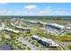 High angle aerial view of retail shopping center showing access roads and parking at 8209 72Nd E St, University Park, FL 34201