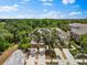 Aerial view of a townhome with two-car garages and lush surrounding landscaping at 8209 72Nd E St, University Park, FL 34201
