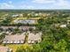 Aerial view of community with wooded backdrops and nearby lakes at 8209 72Nd E St, University Park, FL 34201