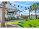 Brewery with outdoor games and waterfront view and string lights at 8209 72Nd E St, University Park, FL 34201