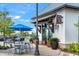 Outdoor coffee shop seating area with waterfront view and umbrella at 8209 72Nd E St, University Park, FL 34201
