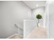 Bright hallway featuring neutral tones and a decorative potted plant at 8209 72Nd E St, University Park, FL 34201