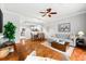Open-concept living area showcases a seamless flow between the living room, dining area, and kitchen at 8209 72Nd E St, University Park, FL 34201