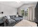 Comfortable living area with a large sectional sofa and a view of the outdoors at 8209 72Nd E St, University Park, FL 34201