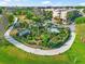 Aerial shot of the community's mini golf course that is surrounded by lush landscaping at 8209 72Nd E St, University Park, FL 34201