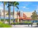 Exterior of the community cinema, framed by lush landscaping and palm trees, offering local entertainment at 8209 72Nd E St, University Park, FL 34201