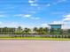 The Mall at University Town Center sign with palm trees and blue skies at 8209 72Nd E St, University Park, FL 34201
