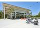 Beautiful community center with large windows, modern design, and comfortable seating area at 9970 Cross River Trl, Parrish, FL 34219