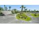 An outdoor pump track for bikes and skateboards with a paved track and landscaping at 9970 Cross River Trl, Parrish, FL 34219