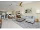 Open-concept floor plan connecting the kitchen, dining, and living areas at 6748 Fairview Ter # 4-202, Bradenton, FL 34203